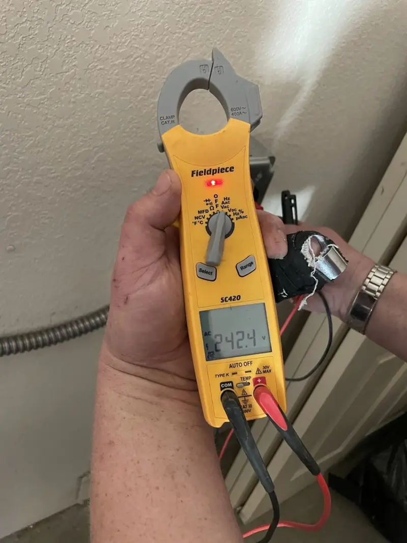 Voltage testing with clamp meter during Generator Installation in Holdenville